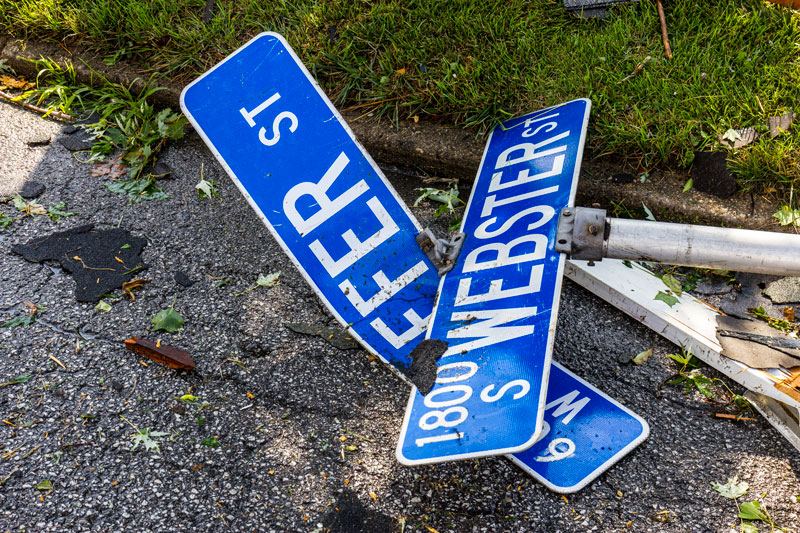 Street signs on the ground after a tornado