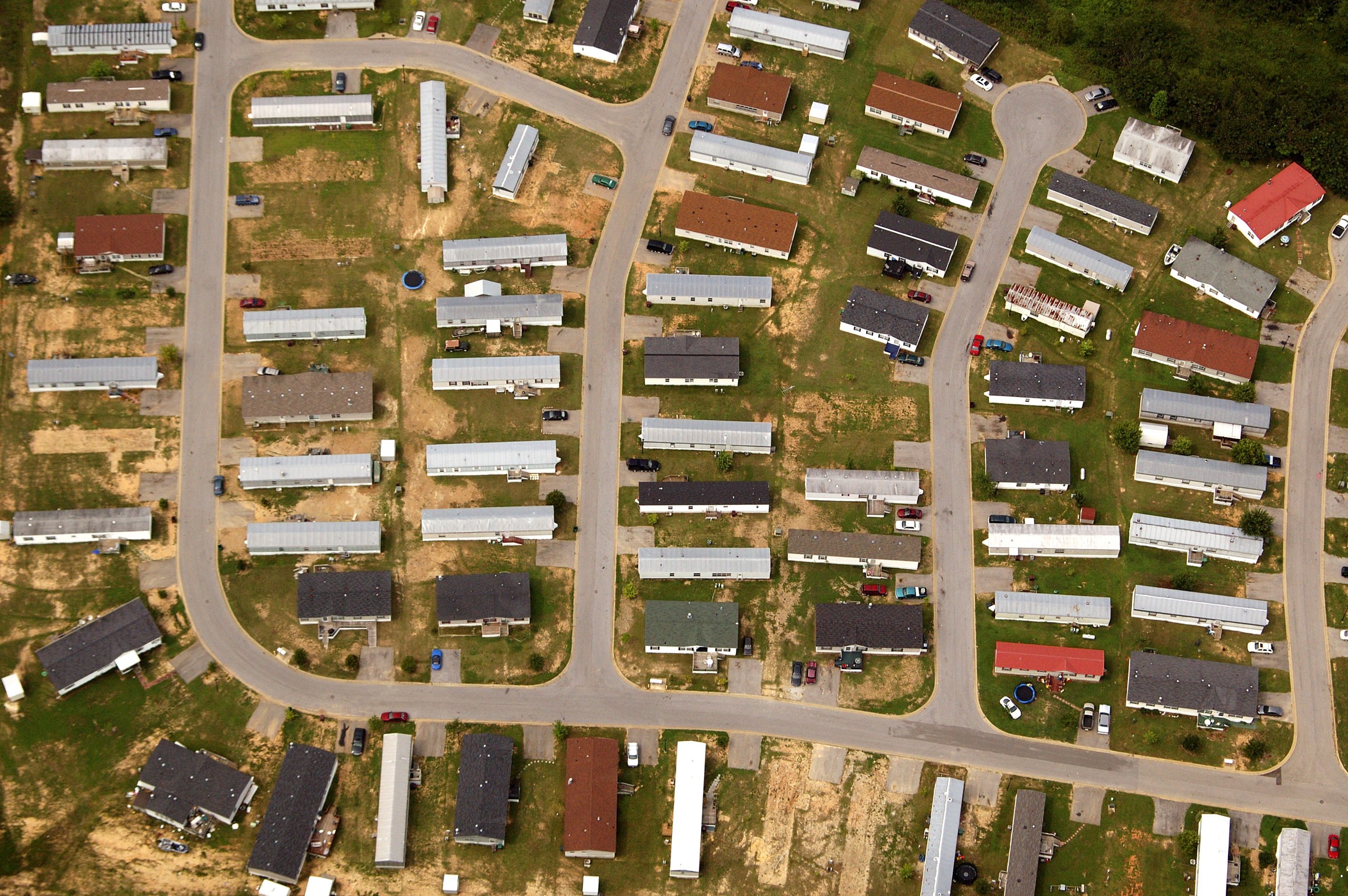 A near vertical aerial abstract of a mobile home park.