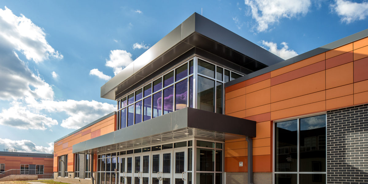 Photo of the front fascade of a new school building